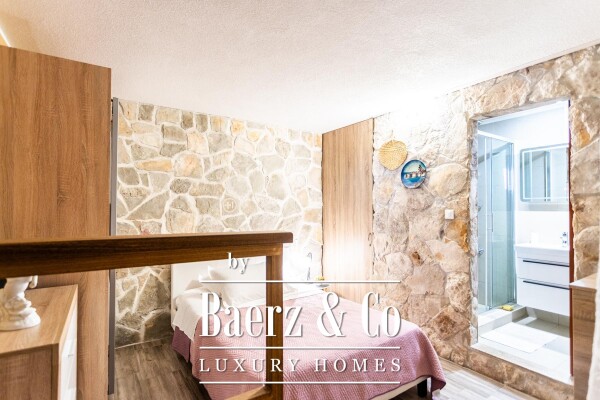 photo 11 Omiš, Stanići, a beautiful house with a sea view, total living area of 160 m² on a land plot of 2546